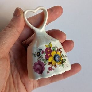 Vintage floral Brinton Bone China bell with heart handle